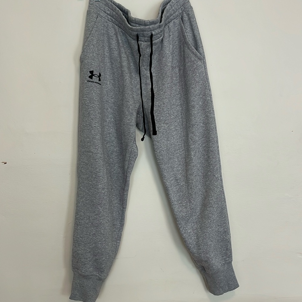 Women’s Under Armour sweatpants. Never worn, grey with black drawstrings.